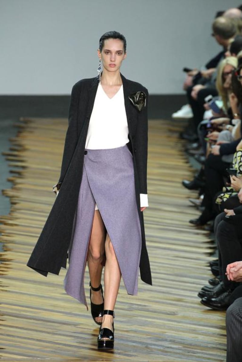 Use sales to to invest in essential clothes and colours. Seen here model on Celine autumn 2014 runway. Courtesy Rex