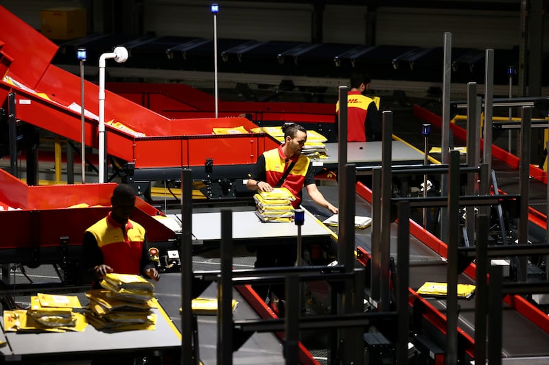 DHL has added 15,000 seasonal employees – and 1,500 robots – to its workforce to cope with rising demand ahead of the holiday season. Reuters