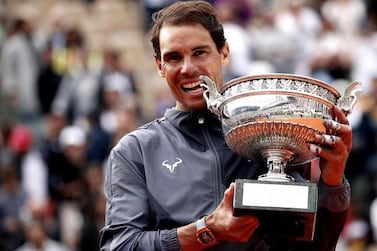 Rafael Nadal won a record-extending 12th French Open at Roland Garros last year. AFP