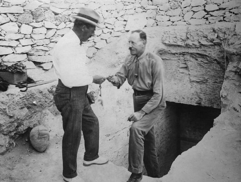 Carter hands over the key to the recently-discovered tomb  in the Valley of the Kings.