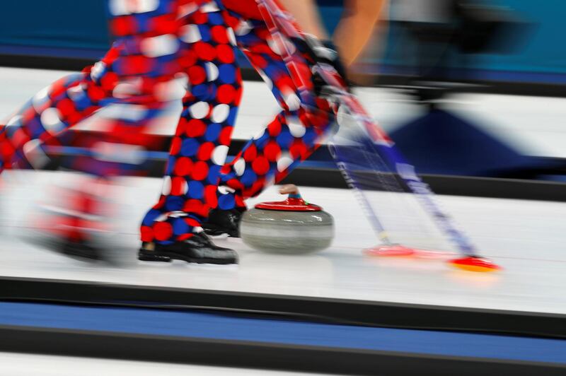 Norway's curlers sweep in dashing trousers. Phil Noble / Reuters