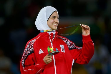 2016 Rio Olympics - Taekwondo -Women's -57kg Victory Ceremony - Carioca Arena 3 - Rio de Janeiro, Brazil - 18/08/2016. Hedaya Malak Wahba (EGY) of Egypt celebrates on the podium with her bronze medals. REUTERS/Peter Cziborra (BRAZIL - Tags: SPORT OLYMPICS SPORT TAEKWONDO) FOR EDITORIAL USE ONLY. NOT FOR SALE FOR MARKETING OR ADVERTISING CAMPAIGNS. Picture Supplied by Action Images