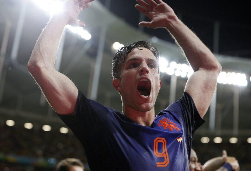 Robin van Persie celebrates after the Netherlands' 5-1 win over Spain at the 2014 World Cup in Salvador, Brazil. Juanjo Martin / EPA / June 13, 2014