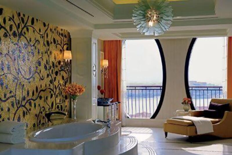 A handout photo of Royal Suite bathroom with window at The Ritz-Carlton Abu Dhabi Grand Canal (Courtesy: The Ritz-Carlton Abu Dhabi, Grand Canal)