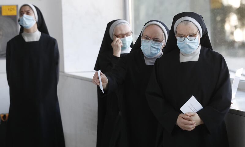 A group of nuns wait to cast their votes at a polling station in Santiago de Compostela, Galicia, Spain. Galicia holds regional elections, which were originally scheduled in April and postponed because of the coronavirus pandemic. EPA