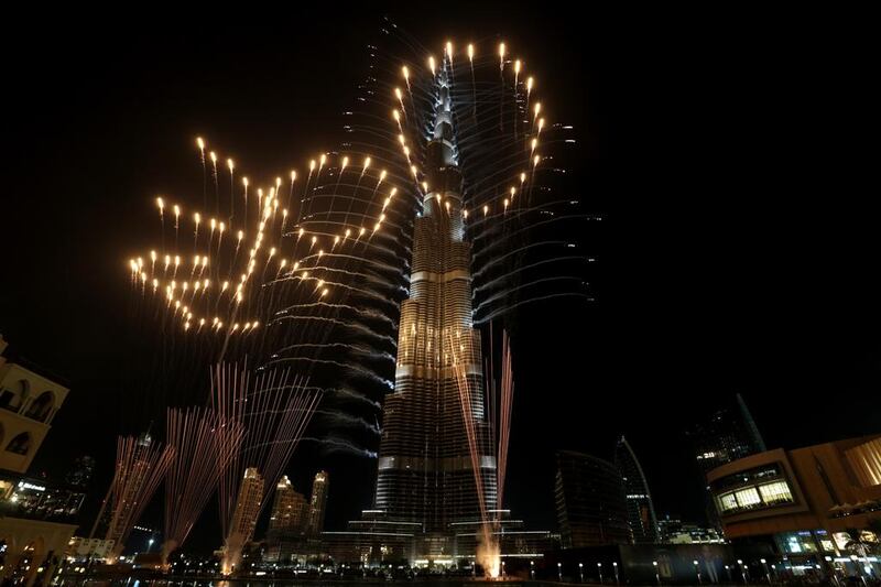 Readers say the Expo 2020 win has put Dubai and the UAE into the forefront as emerging societies on the world stage. Above, fireworks explode from Burj Khalifa after the announcement last month. Christopher Pike / The National

