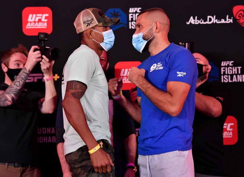 Opponents Alex Oliveira of Brazil, left,  and Peter Sobotta of Poland face off during the UFC Fight Night weigh-in inside Flash Forum on UFC Fight Island in Yas Island, Abu Dhabi. Zuffa LLC via Getty Images