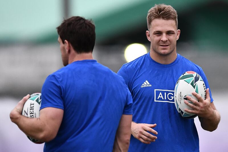 New Zealand's flanker Sam Cane (R) and back row Matt Todd attend the Captain's Run session at Tatsuminomori Seaside Park in Koto City, Tokyo on October 18, 2019, ahead of their Japan 2019 Rugby World Cup quarter-final match against Ireland. (Photo by Anne-Christine POUJOULAT / AFP)