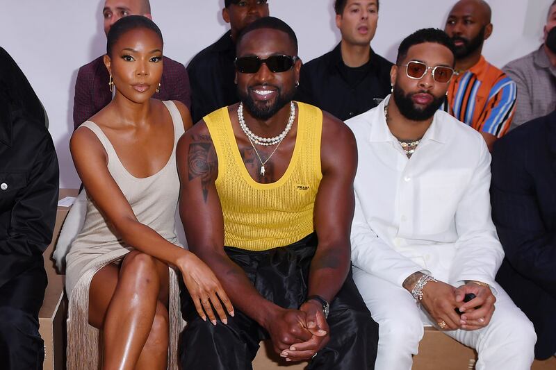 From left, actress Gabrielle Union, former American football player Dwyane Wade and American football player Odell Beckham Jr. Getty Images