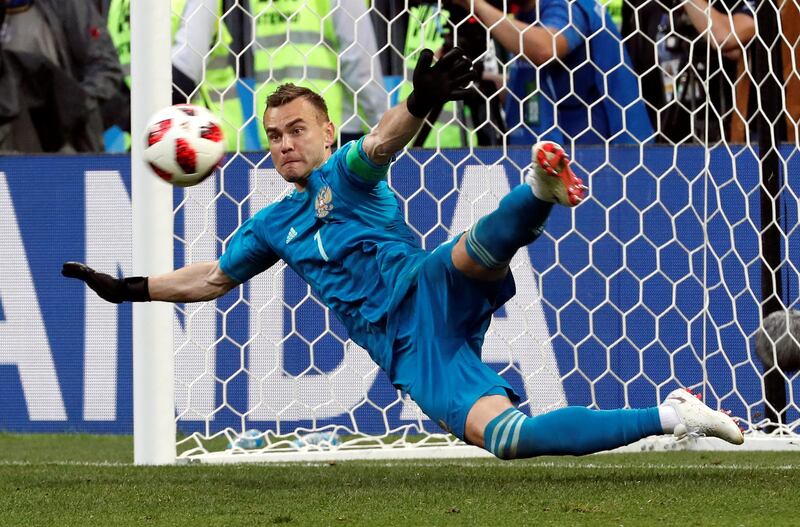 epaselect epa06855824 Goalkeeper Igor Akinfeev of Russia saves the last penalty during the penalty shootout of the FIFA World Cup 2018 round of 16 soccer match between Spain and Russia in Moscow, Russia, 01 July 2018.

(RESTRICTIONS APPLY: Editorial Use Only, not used in association with any commercial entity - Images must not be used in any form of alert service or push service of any kind including via mobile alert services, downloads to mobile devices or MMS messaging - Images must appear as still images and must not emulate match action video footage - No alteration is made to, and no text or image is superimposed over, any published image which: (a) intentionally obscures or removes a sponsor identification image; or (b) adds or overlays the commercial identification of any third party which is not officially associated with the FIFA World Cup)  EPA/SERGEI CHIRIKOV   EDITORIAL USE ONLY
