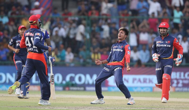 Delhi Daredevils Sandeep Lamichhane, center, celebrates the wicket of Mumbai Indians Surya kumar Yadav during the VIVO IPL Twenty20 cricket match in New Delhi, India, Sunday, May 20, 2018. (AP Photo/Manish Swarup)