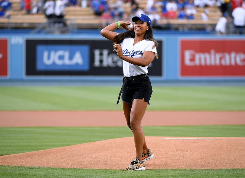 Naomi Osaka throws out a ceremonial first pitch before the game between the Los Angeles Angels and the Los Angeles Dodgers at Dodger Stadium on Wednesday. AFP