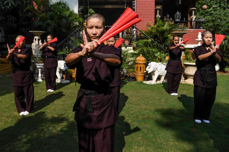 The nuns are from the 800-strong Druk Amitabha Mountain Nunnery in Nepal and belong to the centuries-old Drukpa school of Tibetan Buddhism.