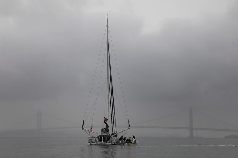 Swedish 16-year-old activist Greta Thunberg stands on the Malizia II racing yacht in New York Harbor as she nears the completion of her trans-Atlantic crossing in order to attend a United Nations summit on climate change in New York, U.S., August 28, 2019. REUTERS/Mike Segar