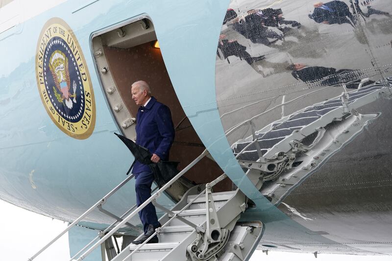 Mr Biden descends the steps of the aircraft at Dublin. Reuters