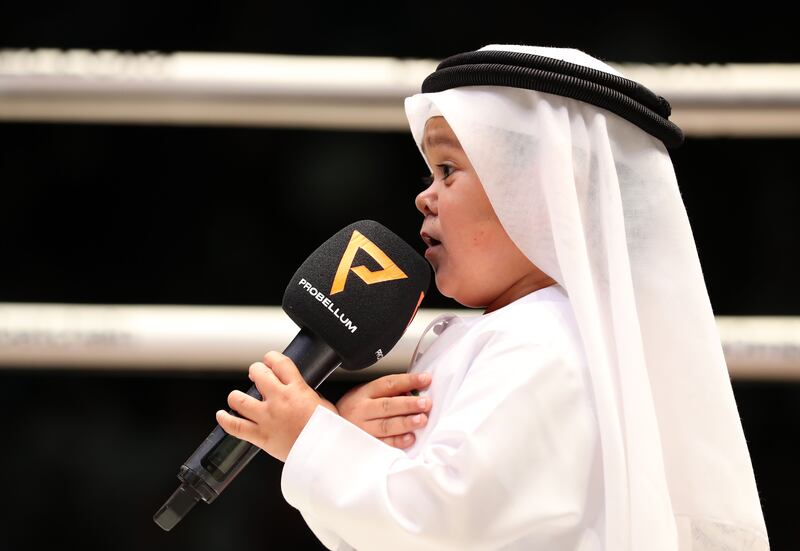 Rozik sang the UAE national anthem at the boxing event. Chris Whiteoak / The National