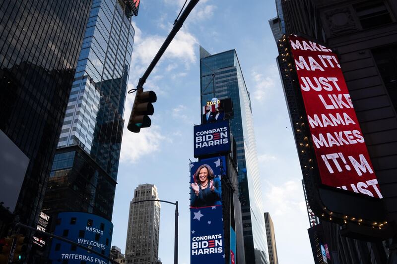 Signs read "Congrats Biden Harris" in the Times Square neighbourhood of New York, US.  Bloomberg