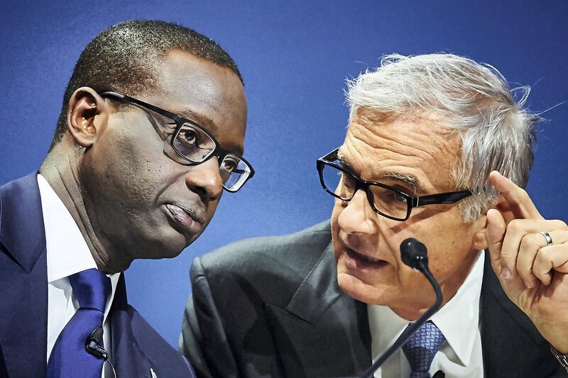 Credit Suisse CEO Tidjane Thiam (L) and chairman Urs Rohner attend the annual shareholders' meeting of the Swiss banking group on April 28, 2017 in Zurich. (Photo by Michael Buholzer / AFP)
