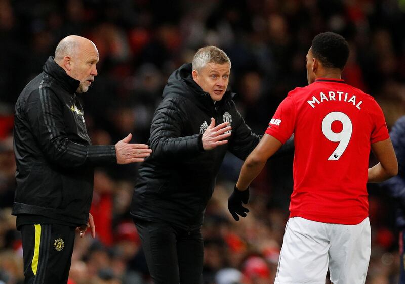 Manchester United manager Ole Gunnar Solskjaer and assistant manager Mike Phelan give instructions to Anthony Martial during the Premier League match against Aston Villa. Reuters