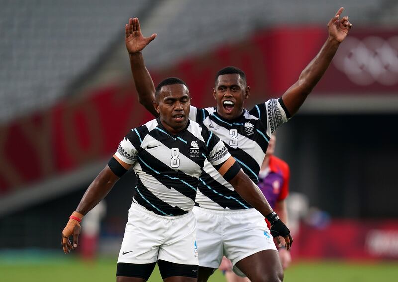 Fiji's Waisea Nacuqu and Kalione Nasoko celebrate victory.