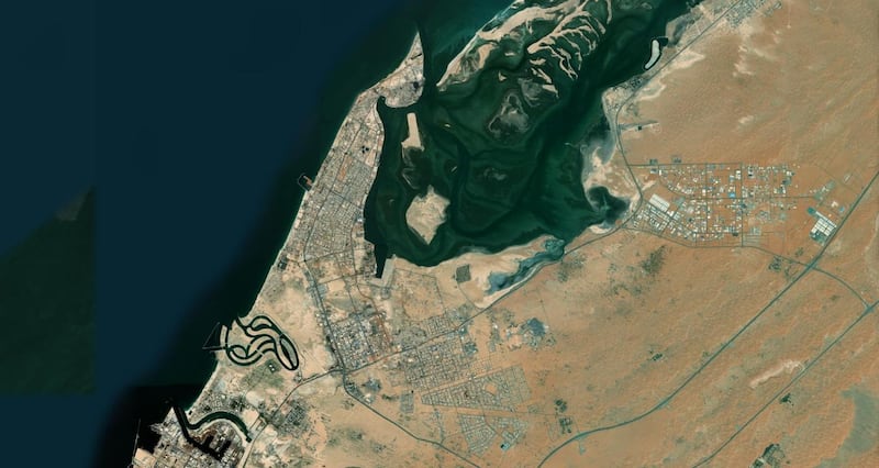 Umm Al Quwain, one of the seven emirates of the UAE, seen from space. The emirate is on a peninsula and has many attractive sites, including ancient forts. Zoom Earth