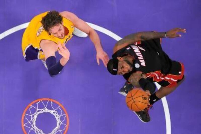 LeBron James, right, of the Miami Heat, was too hot for the Los Angeles Lakers to handle. Mark J Terrill / AP Photo