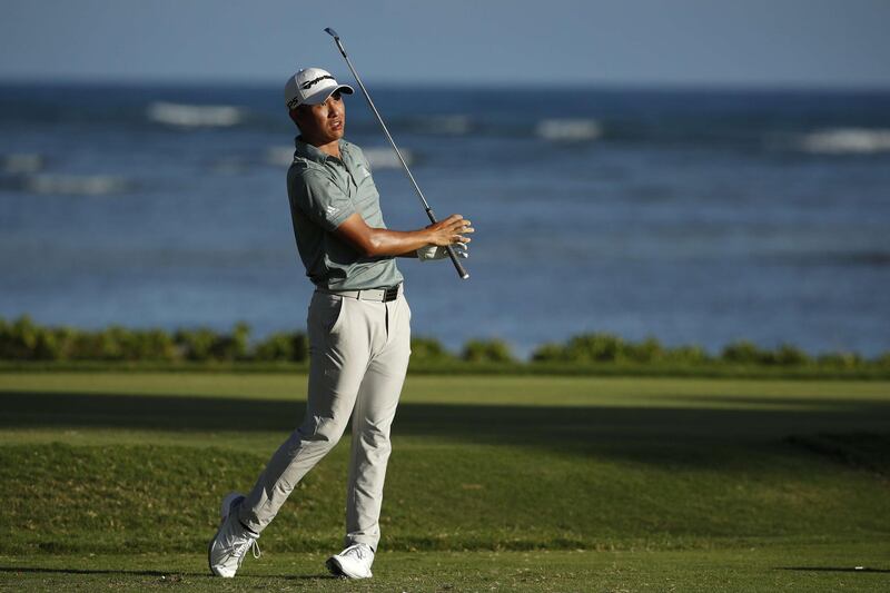 Collin Morikawa plays his shot from the 17th tee during the third round of the Sony Open in Hawaii. AFP