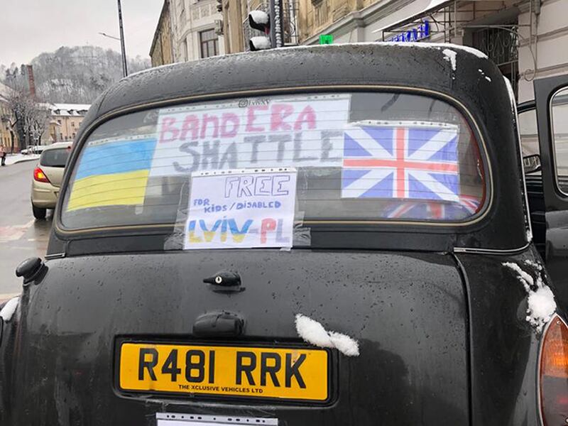 British-Ukrainian Roman Tymchyshyn is helping refugees to cross the Polish border using his London black cab. PA