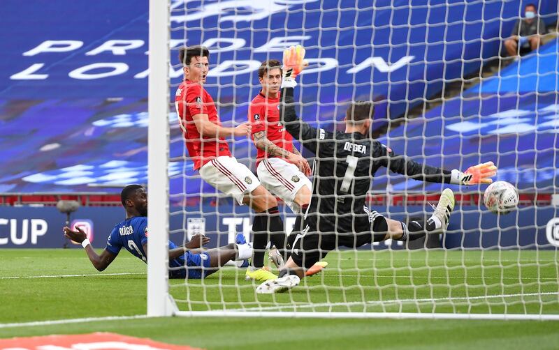 Manchester United defender Harry Maguire scores an own-goal to put Chelsea 3-0 up. Getty