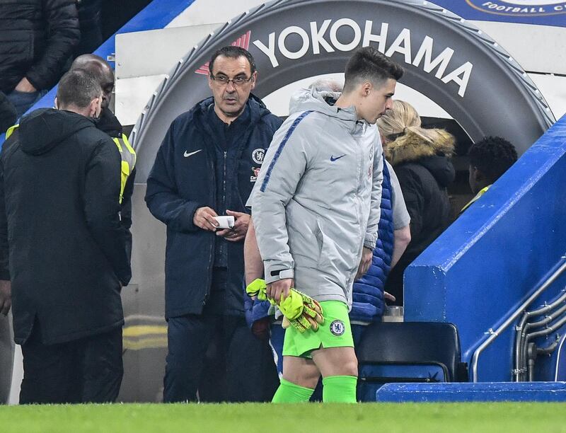 Chelsea manager Maurizio Sarri and Kepa Arrizabalaga as the Spanish goalkeeper prepares to take his place on the bench. EPA