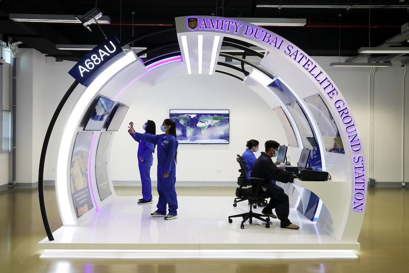 DUBAI, UNITED ARAB EMIRATES , September 21 – 2020 :- Students of Aerospace Engineering working in the Satellite Ground Station at the Aerospace Lab at the Amity University in Academic City in Dubai.  (Pawan Singh / The National) For News. Story by Sarwat