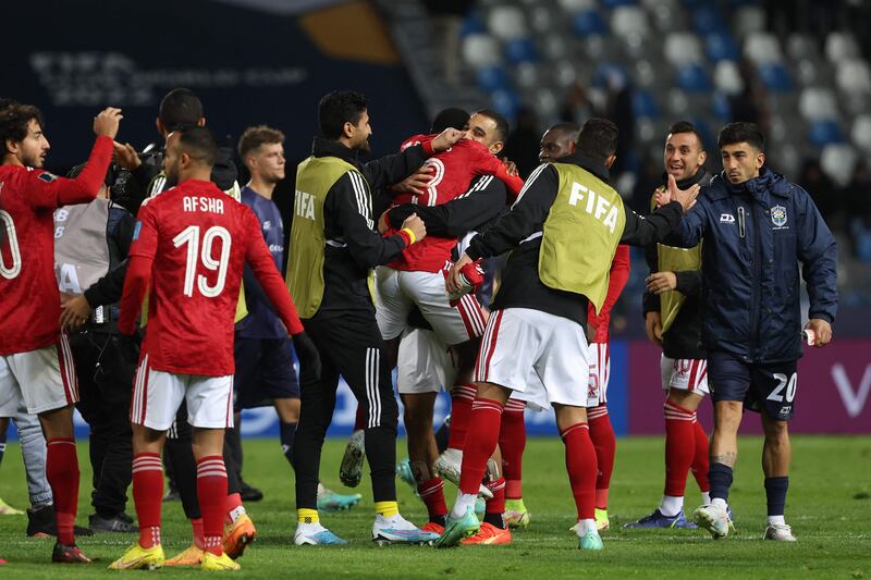 Al Ahly players celebrate winning the match against Auckland City. AFP