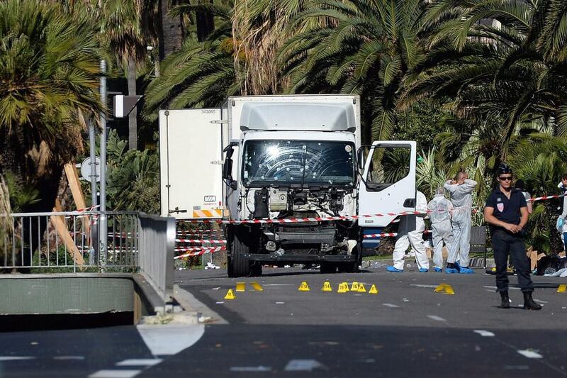 Police secure the area where a truck drove into a crowd during Bastille Day celebrations in Nice, France in July 2016. Andreas Gebert / EPA