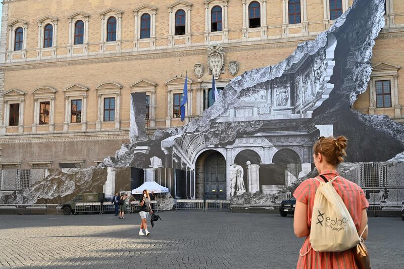 French artist JR's installation 'Punto di Fuga' on the facade of the Palazzo Farnese, the French Embassy in Rome