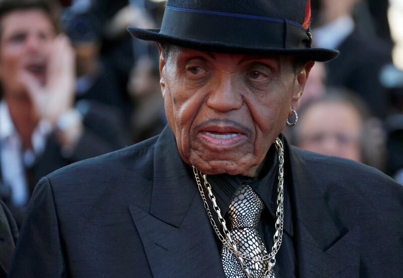 FILE PHOTO: Joe Jackson, father of the late pop star Michael Jackson, poses on the red carpet as he arrives for the screening of the film "Sils Maria" (Clouds of Sils Maria) in competition at the 67th Cannes Film Festival in Cannes, France, May 23, 2014.     REUTERS/Regis Duvignau/File Photo