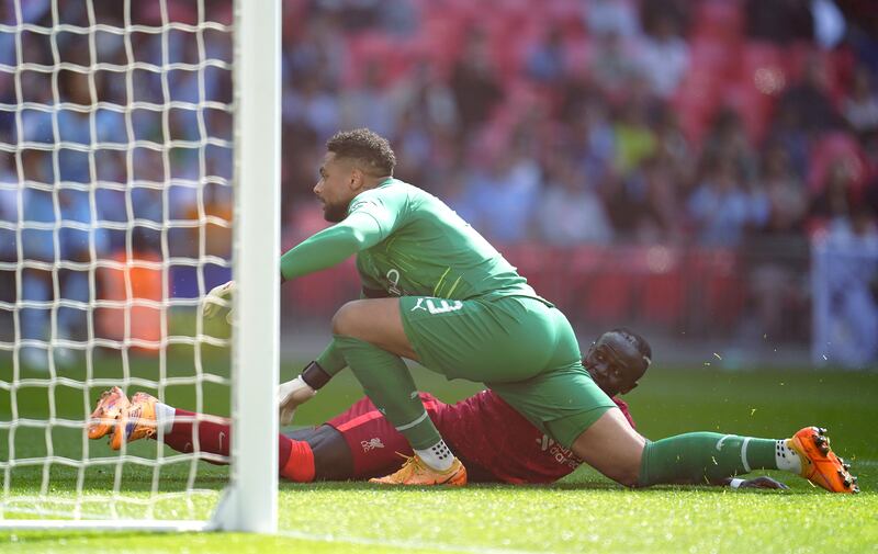 Manchester City goalkeeper Zack Steffen looks on as his error leads to Sadio Mane scoring Liverpool's second goal. PA