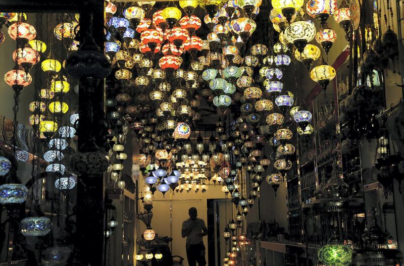 Dubai, United Arab Emirates - June 7, 2016.  Colourful lights made from Turkey, at one of the shops in the Old Souk of Bur Dubai.  ( Jeffrey E Biteng / The National )  Editor's Note;  ID 75506 *** Local Caption ***  JB070616-RamadanLights03.jpg