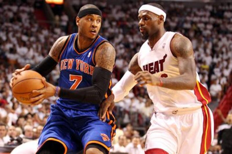MIAMI, FL - MAY 09: Forward LeBron James #6 of the Miami Heat defends Forward Carmelo Anthony#7 of the New York Knicks in Game Five of the Eastern Conference Quarterfinals in the 2012 NBA Playoffs on May 9, 2012 at the American Airines Arena in Miami, Florida. NOTE TO USER: User expressly acknowledges and agrees that, by downloading and or using this photograph, User is consenting to the terms and conditions of the Getty Images License Agreement.   Marc Serota/Getty Images/AFP== FOR NEWSPAPERS, INTERNET, TELCOS & TELEVISION USE ONLY ==

