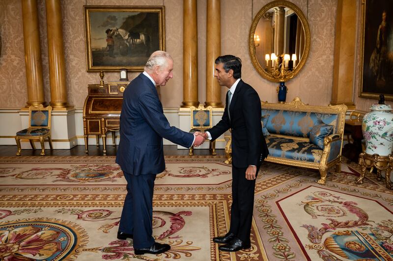 King Charles III welcomes Mr Sunak during an audience at Buckingham Palace, where he invited the newly elected leader of the Conservative Party to become Prime Minister and form a new government in October 2022. Getty Images