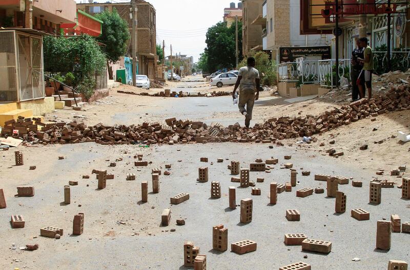 Blocks of brick are used to make barricades. AFP