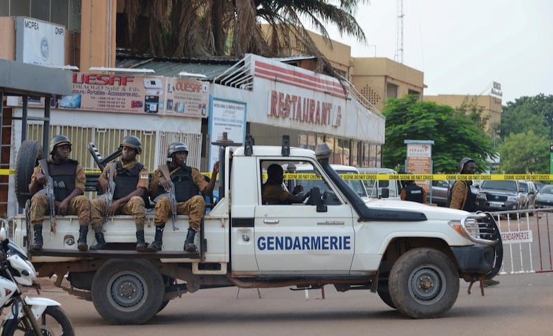 FILE PHOTO: Security forces deploy to secure the area after an overnight attack on a restaurant in the Burkina Faso capital Ouagadougou, August 14, 2017. REUTERS/Hamany Daniex/File Photo