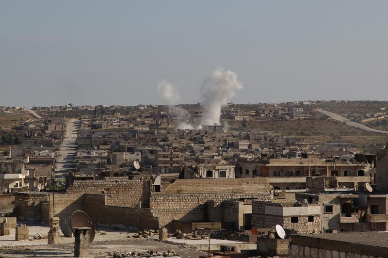 Smoke billows following a reported air strike by pro-regime forces in the town of Maaret Al-Numan in Syria's northwestern Idlib province.   AFP