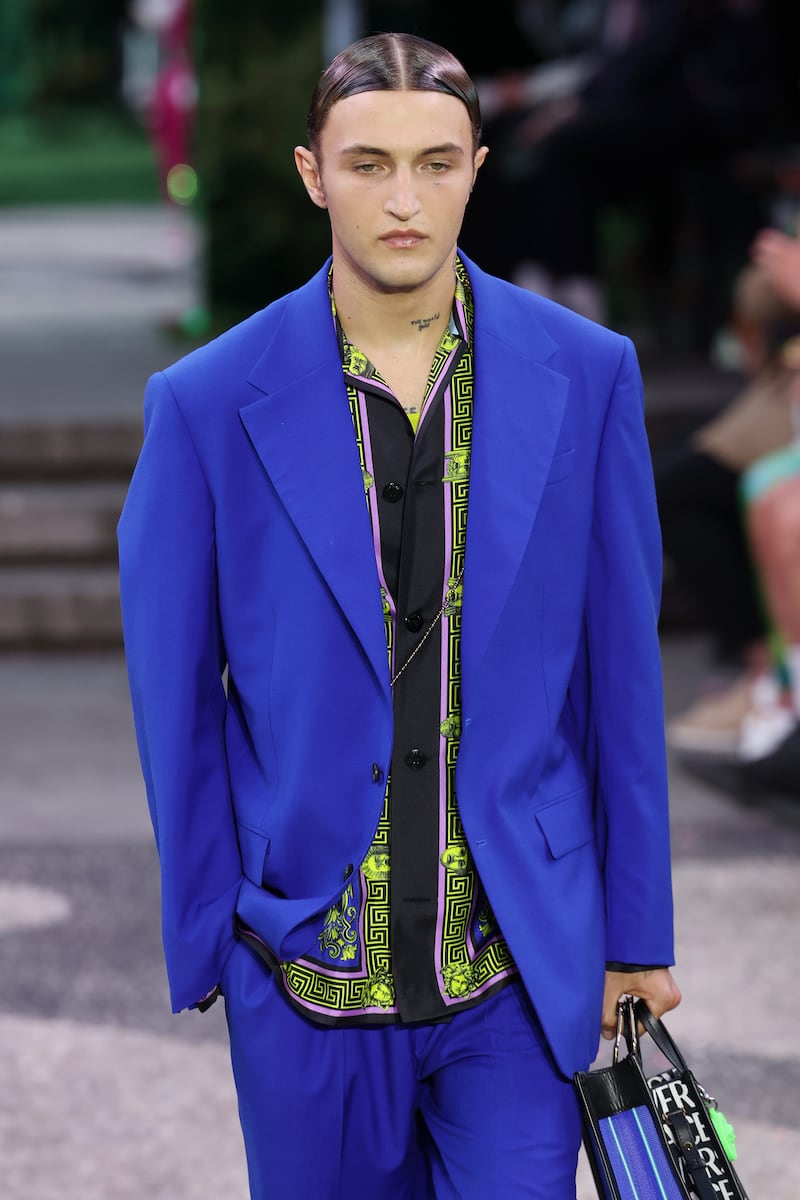 Anwar Hadid walks the runway at the Versace fashion show during Milan Fashion Week spring/summer 2023 on June 18, 2022, in Milan, Italy. Getty Images