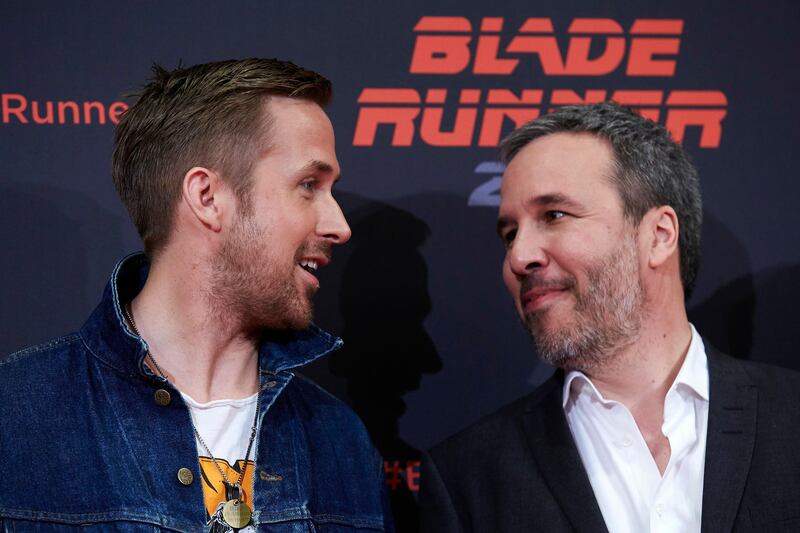 epa06037431 Canadian filmmaker Denis Villeneuve (R) and Canadian actor/cast member Ryan Gosling (L) pose for the media during the presentation of 'Blade Runner 2049' in Barcelona, Spain, 19 June 2017. The movie opens in Spanish theaters on 06 October.  EPA/ALEJANDRO GARCIA