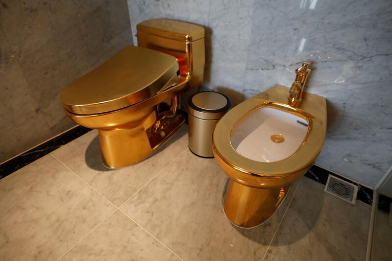 Gold-plated toilets are seen at Dolce Hanoi Golden Lake hotel. Reuters