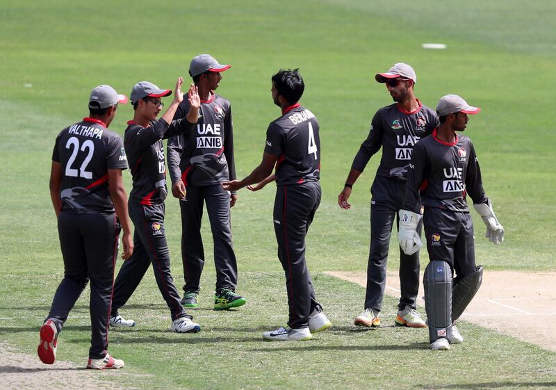 Dubai, United Arab Emirates - April 29, 2019: UAE's Aaron Benjamin takes the wicket of Iran's Abbas Ali Raeisi in the game between UAE U19's and Iran U19's in the Unser 19 Asian Cup qualifiers. Monday the 29th of April 2019. Dubai International Stadium, Dubai. Chris Whiteoak / The National