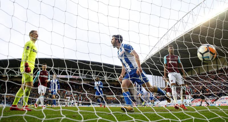 Striker: Will Grigg (Wigan Athletic) – The Northern Ireland international was on fire again, scoring both goals as West Ham were beaten by the League One leaders. Carl Recine / Reuters