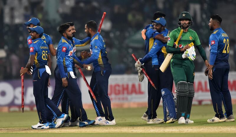 Sri Lanka celebrate after beating Pakistan in the second T20 at the Gaddafi Stadium in Lahore. AFP