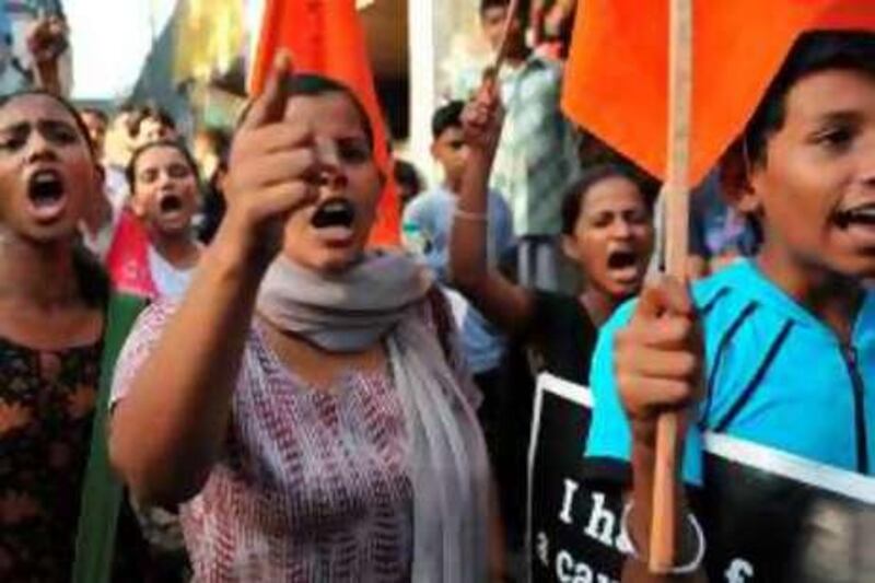 Members of the Bharatiya Janata Party students wing shout slogans during an anti-Maoist rebels and anti-goverment protest in Mumbai on May 30, 2010. Rescue workers completed search operations on May 30 after pulling out 146 bodies from the site of a train wreck in northeast India blamed on Maoist rebels. If confirmed as a Maoist strike, the May 28 derailment of a Kolkata-Mumbai express train would be the deadliest attack by the rebels in recent memory. The government has recently been severely criticised for its handling of the worsening left-wing insurgency. AFP PHOTO Sajjad HUSSAIN *** Local Caption ***  642783-01-08.jpg