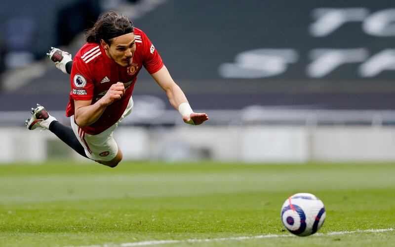 LONDON, ENGLAND - APRIL 11: Edinson Cavani of Manchester United scores their side's second goal during the Premier League match between Tottenham Hotspur and Manchester United at Tottenham Hotspur Stadium on April 11, 2021 in London, England. Sporting stadiums around the UK remain under strict restrictions due to the Coronavirus Pandemic as Government social distancing laws prohibit fans inside venues resulting in games being played behind closed doors. (Photo by Adrian Dennis - Pool/Getty Images)